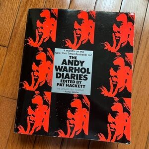 Paperback copy of The Andy Warhol Diaries